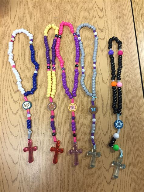 beads and crosses to make a rosary